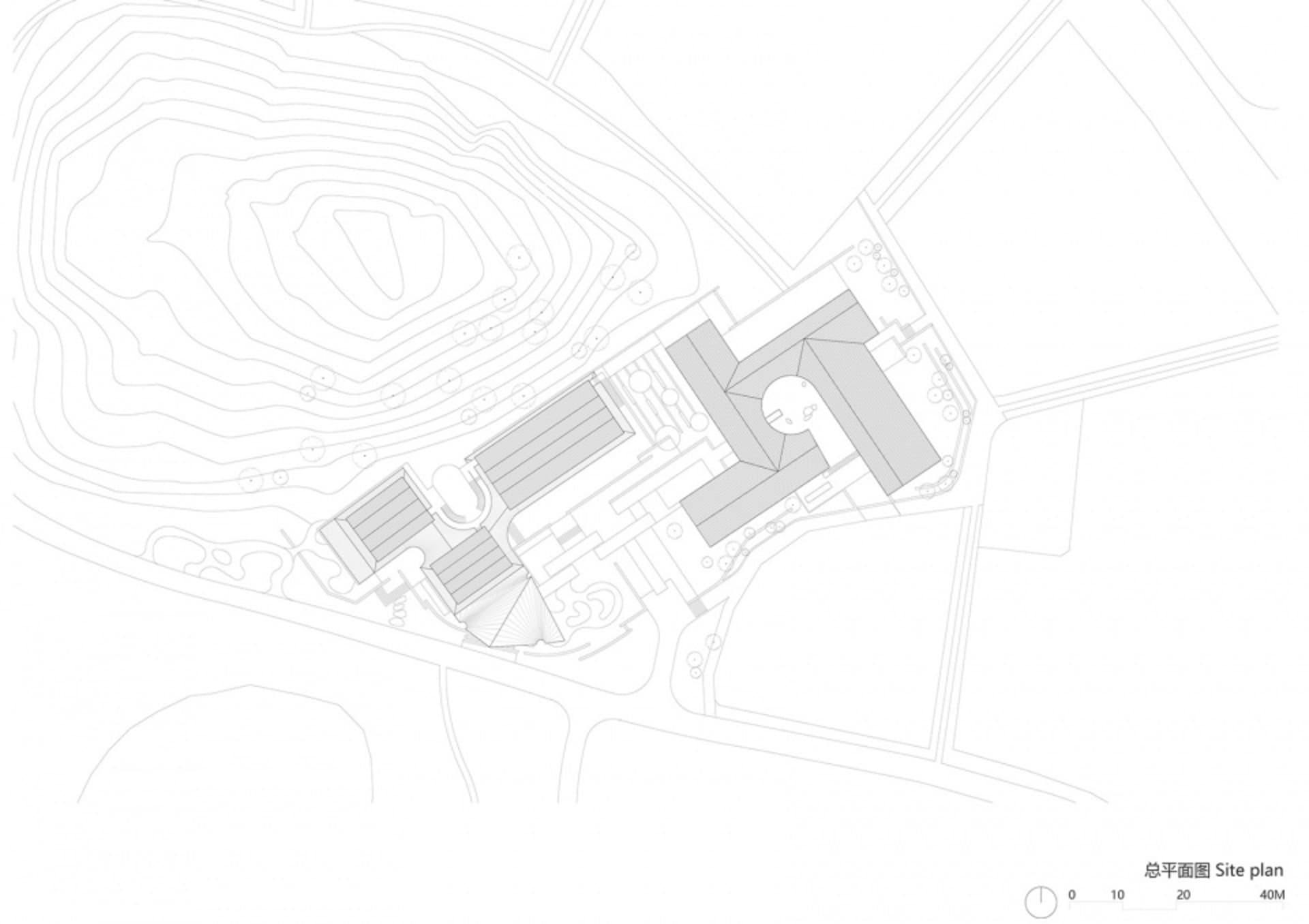 Architectural rendering of a modern building with a large courtyard, featuring a mix of stone and concrete elements and well-lit surroundings