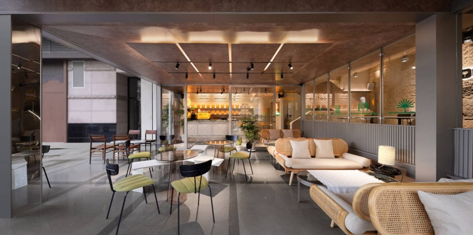 A modern restaurant interior with wood and metal elements, featuring chairs, dining tables, potted plants, and a cozy atmosphere