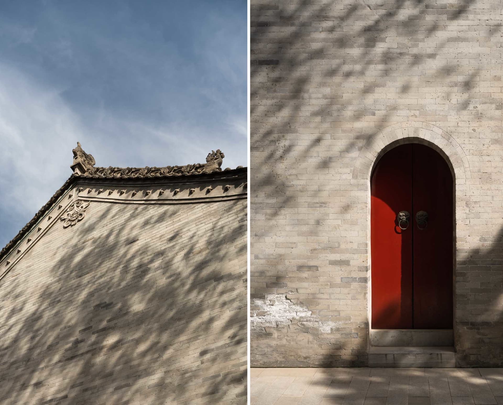 Aged historic building with a brick exterior, stone archway, and a red door, set against a neutral background
