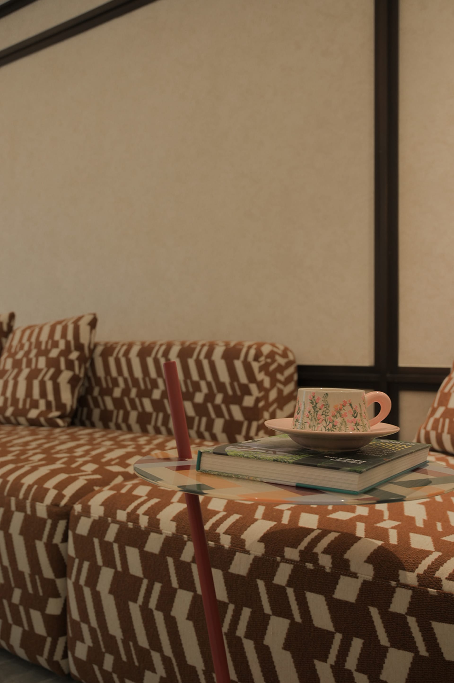 A cozy living space with two couches, chairs, and a coffee table, featuring a pink cup and white walls, creating a clean and inviting atmosphere