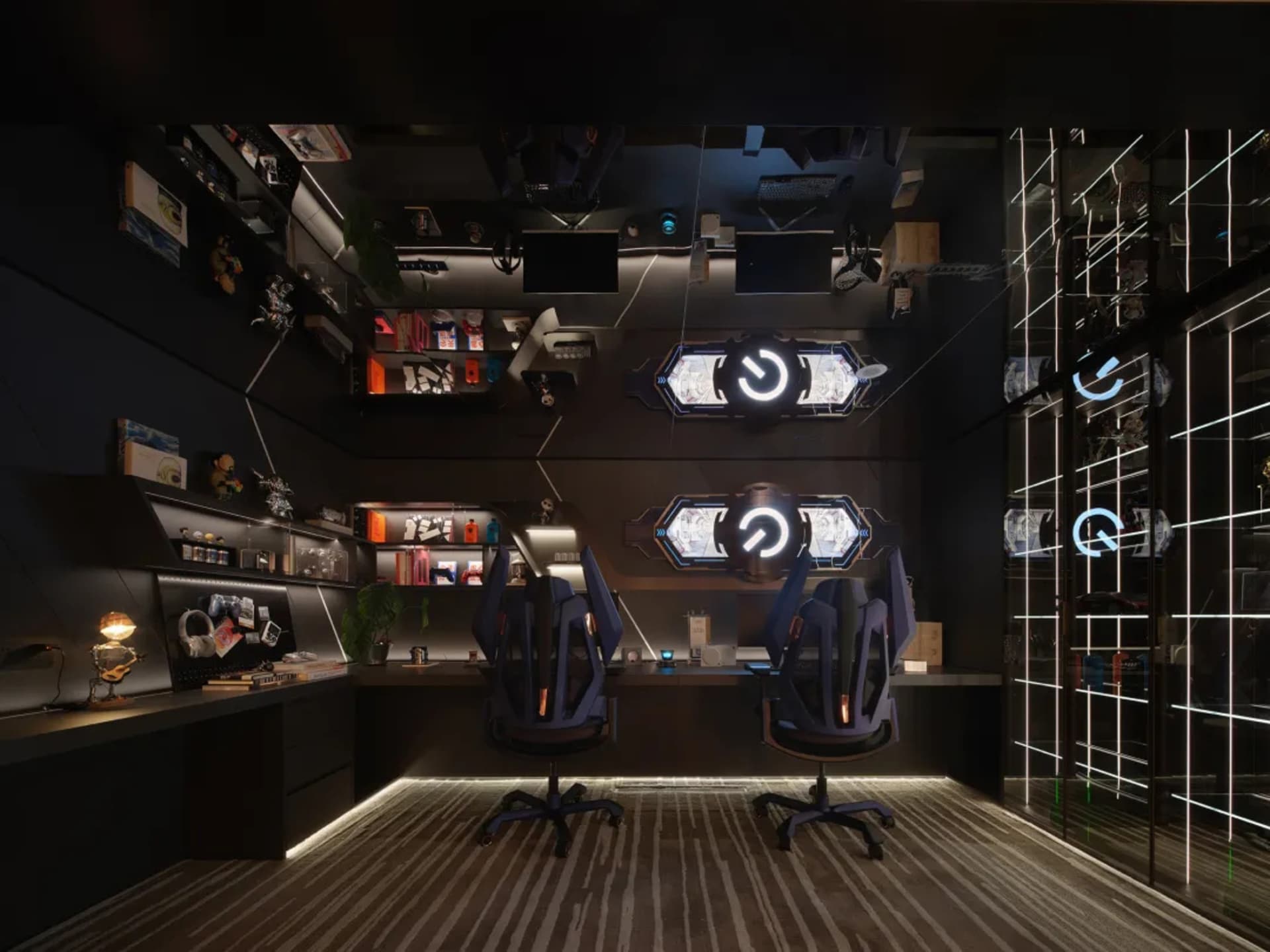 Professional office space with two desks, three TV screens, and various pieces of furniture, creating a functional and organized atmosphere
