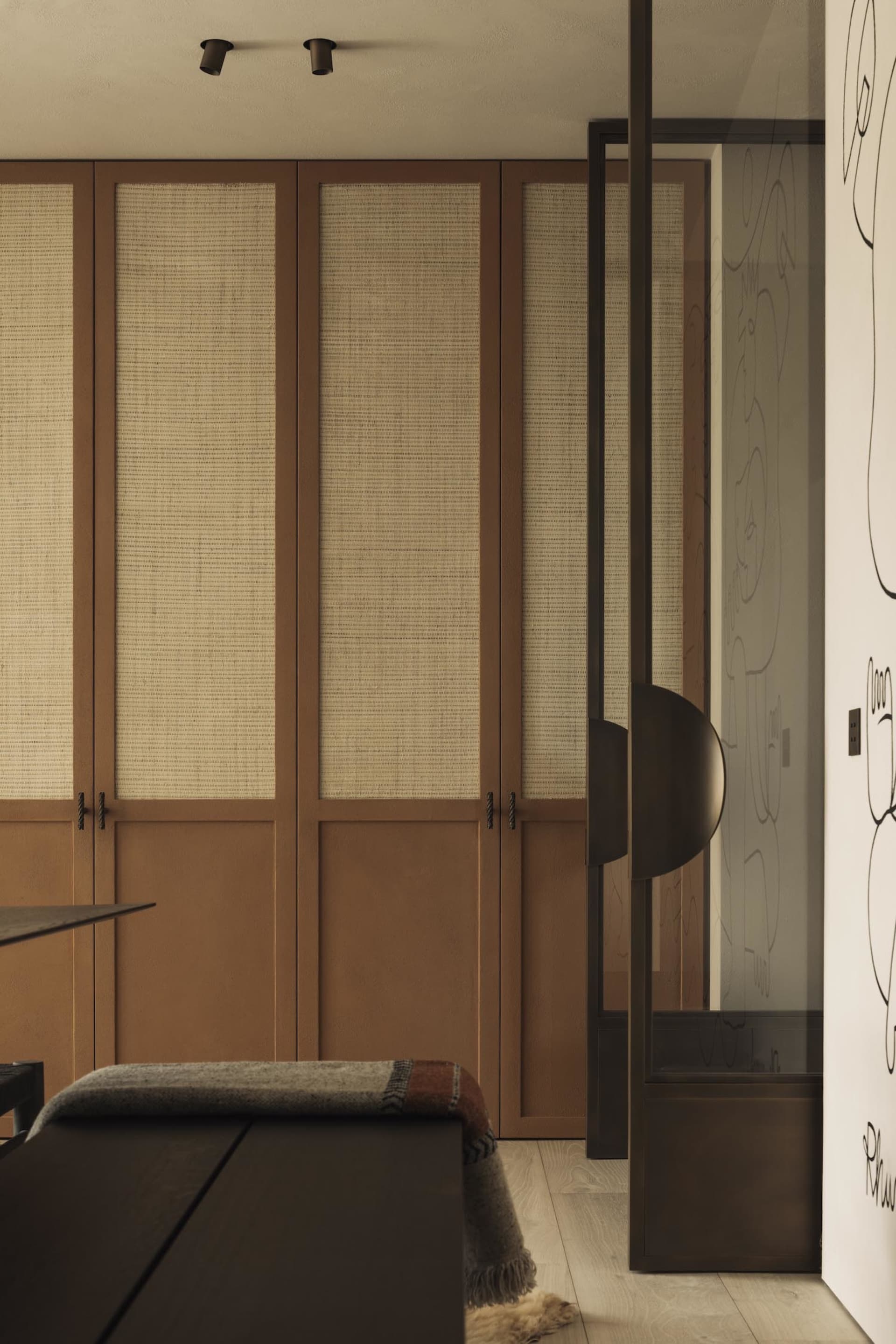 Warm and inviting interior design featuring wooden walls, brown furniture, and comfortable seating arrangements