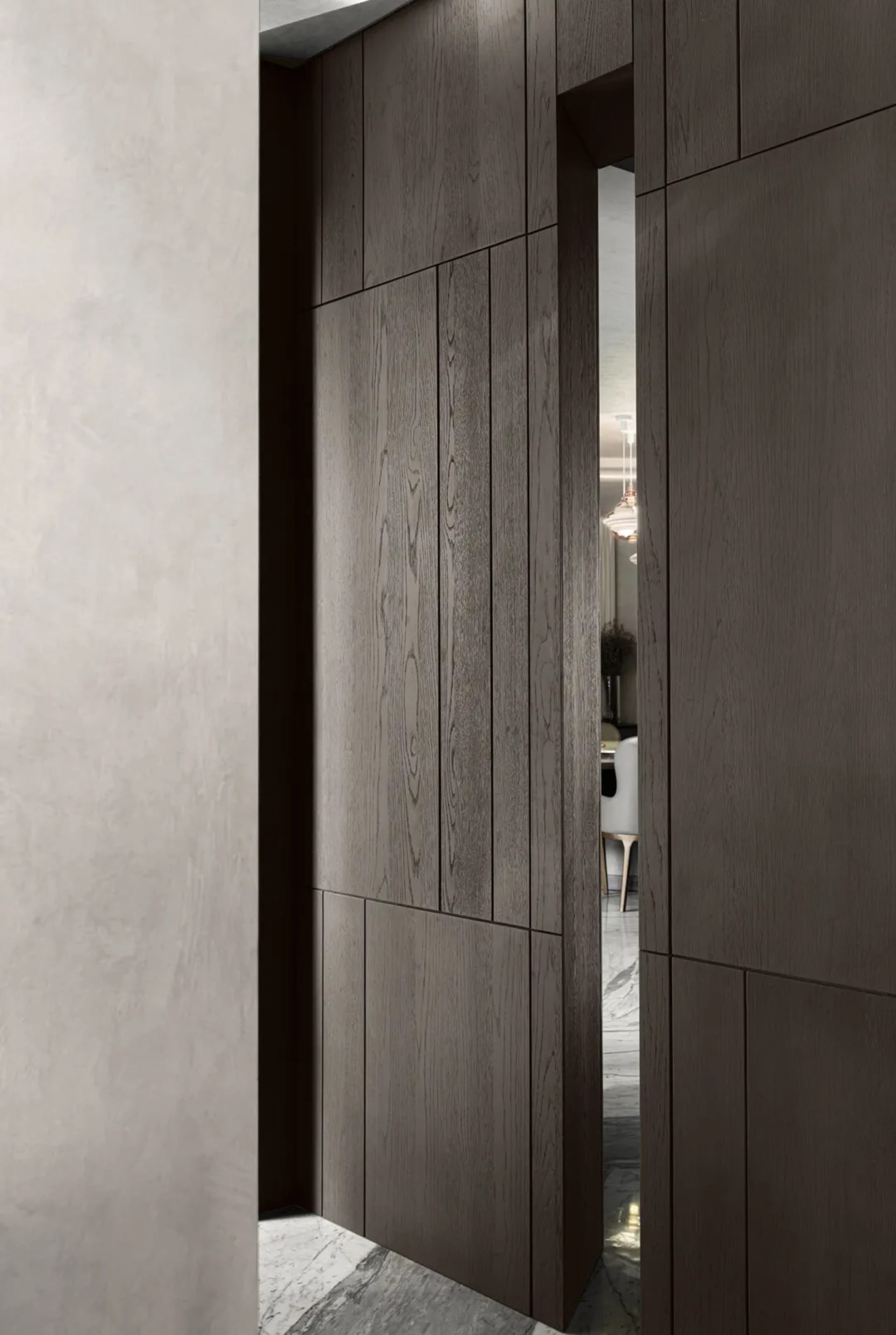 A warm and inviting home entrance with a wooden doorway leading to a dining area with a table and chairs