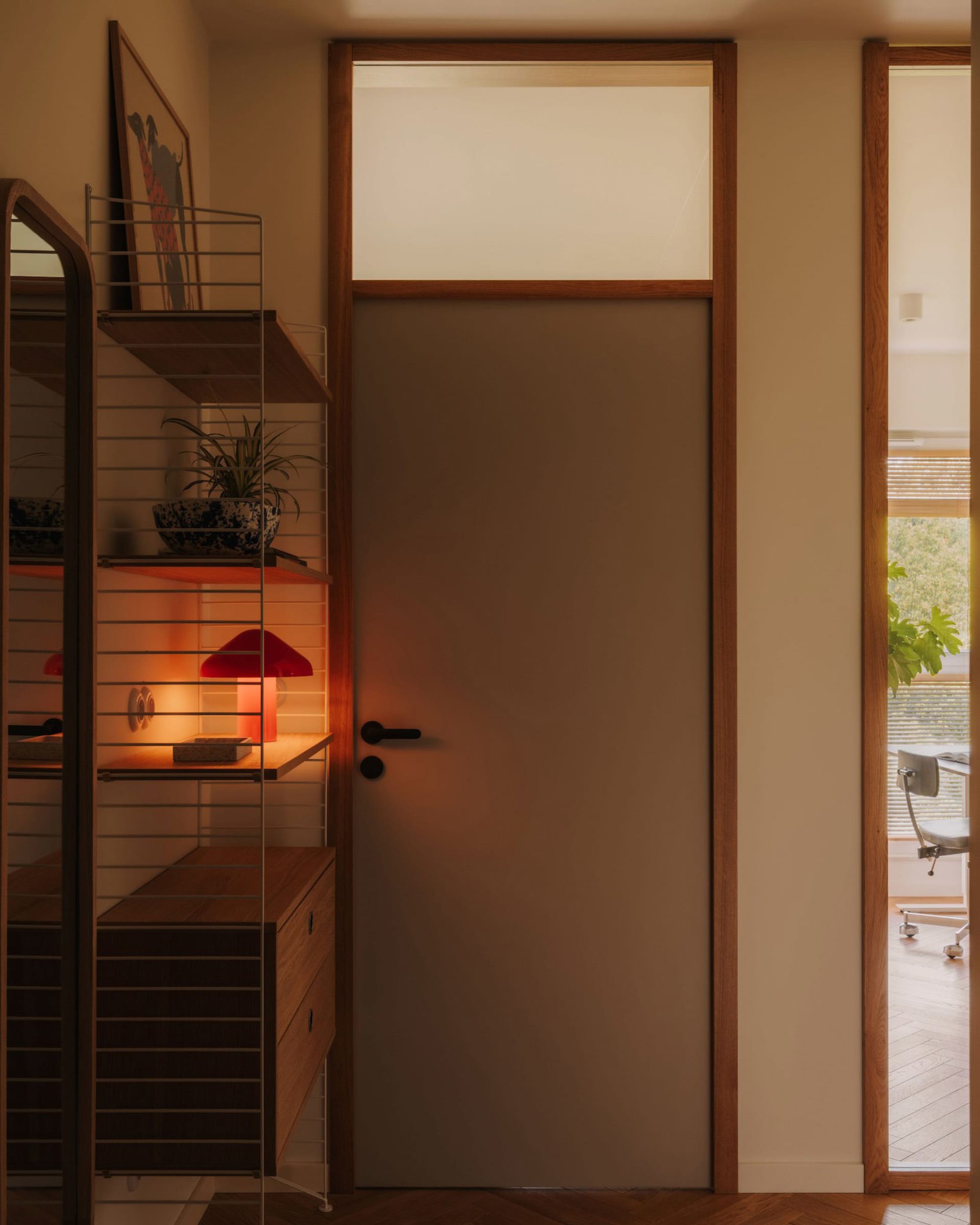 A warm and inviting living space with a doorway, potted plants, and a chair, illuminated by natural light through a glass door window