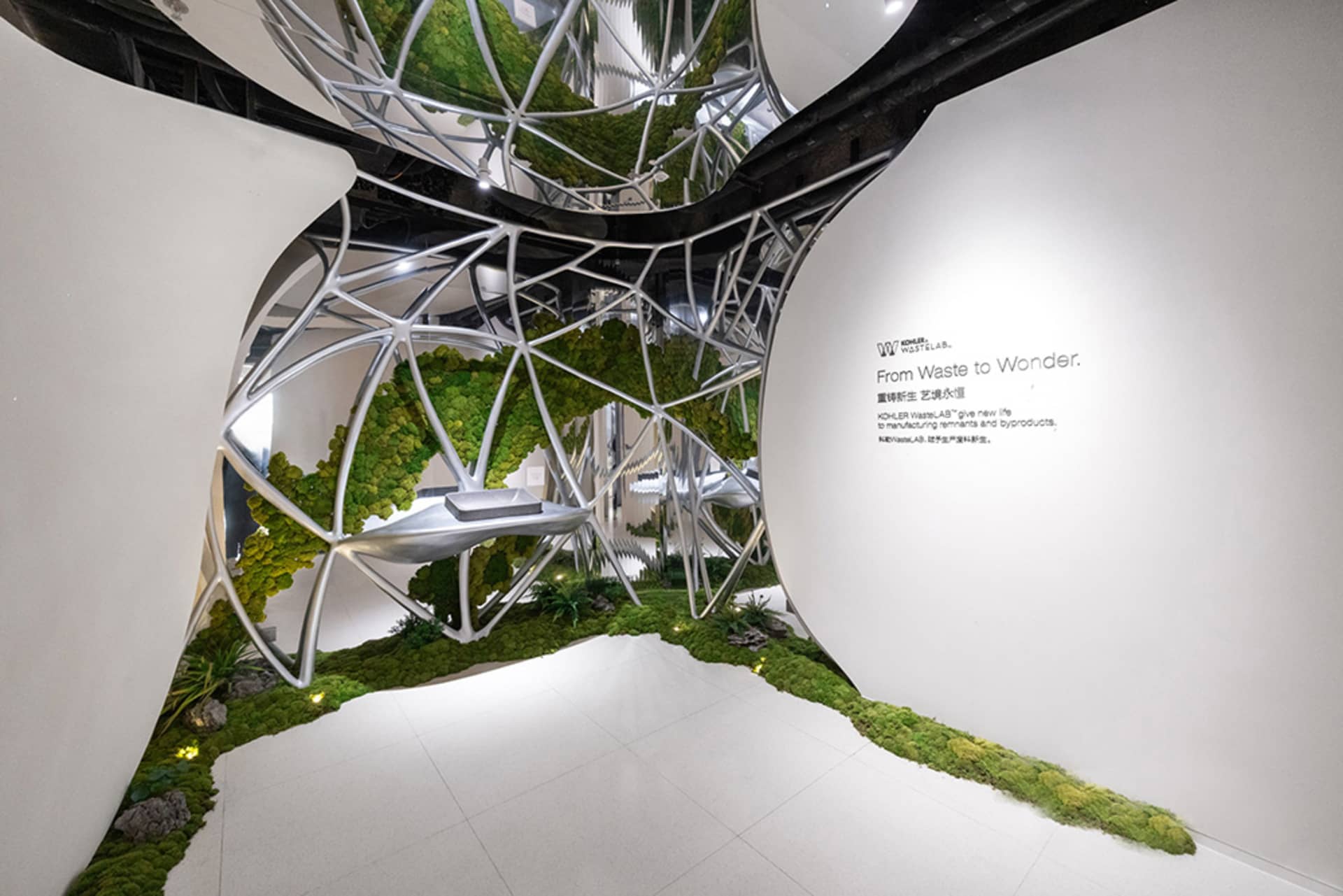 A modern, minimalist space filled with lush greenery and a dome-shaped structure, with soft and diffused lighting creating a warm ambiance
