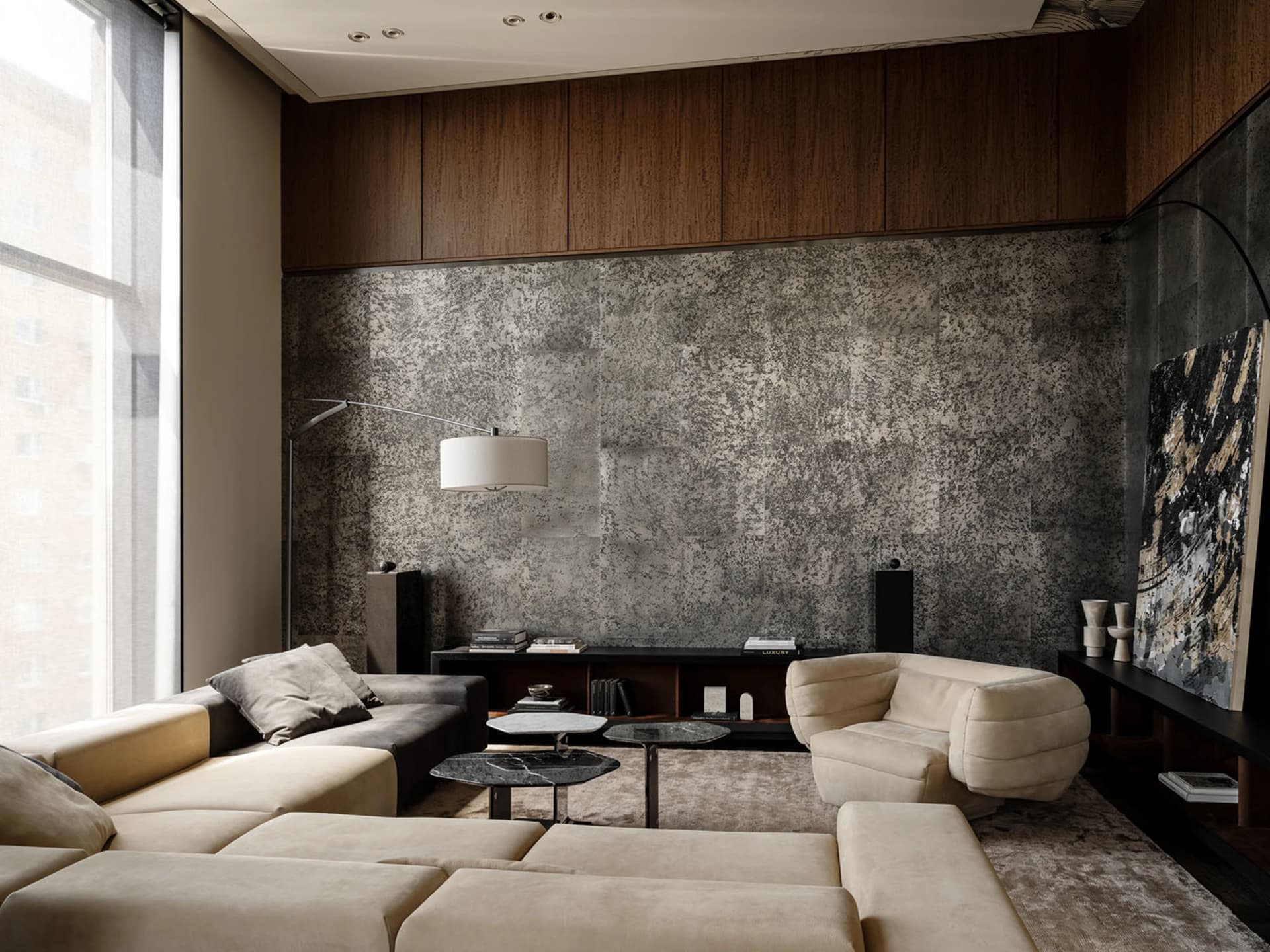 A modern living room with a central couch, a chair, and a dining table, featuring a clean and minimalist design with a focus on functionality and comfort