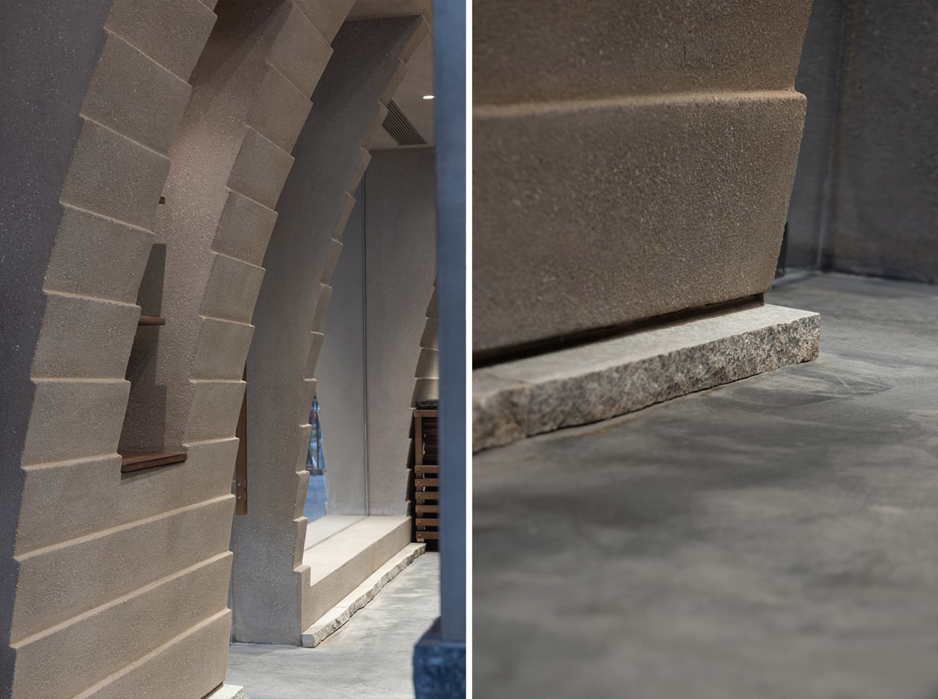 A stone-walled building with a stone floor, illuminated by natural sunlight, creating a warm and inviting atmosphere