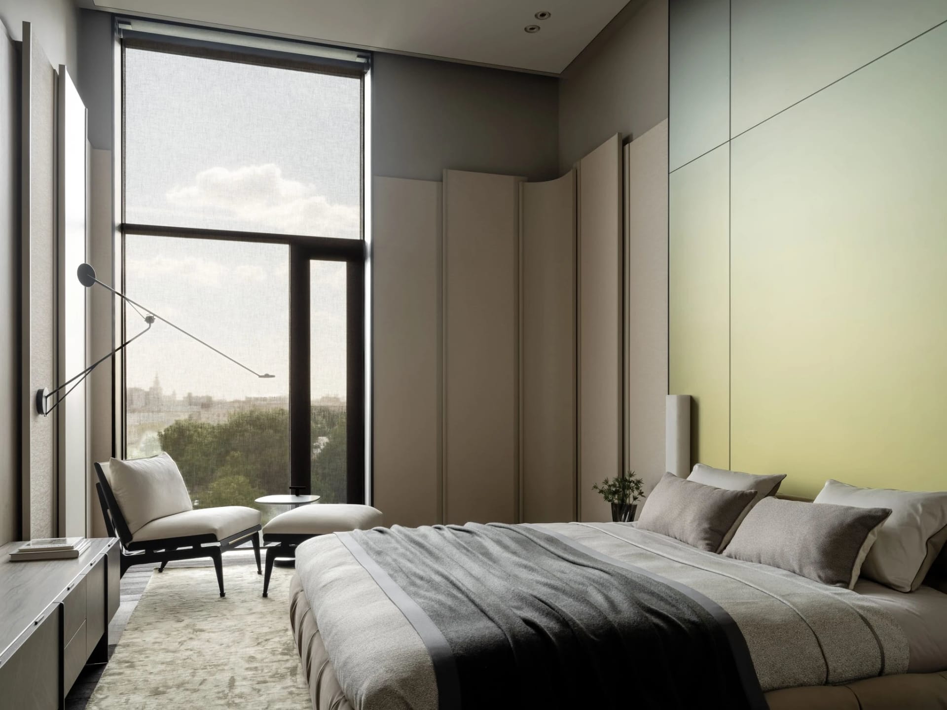 Cozy modern bedroom with a gray bed, chair, and natural light from a large window