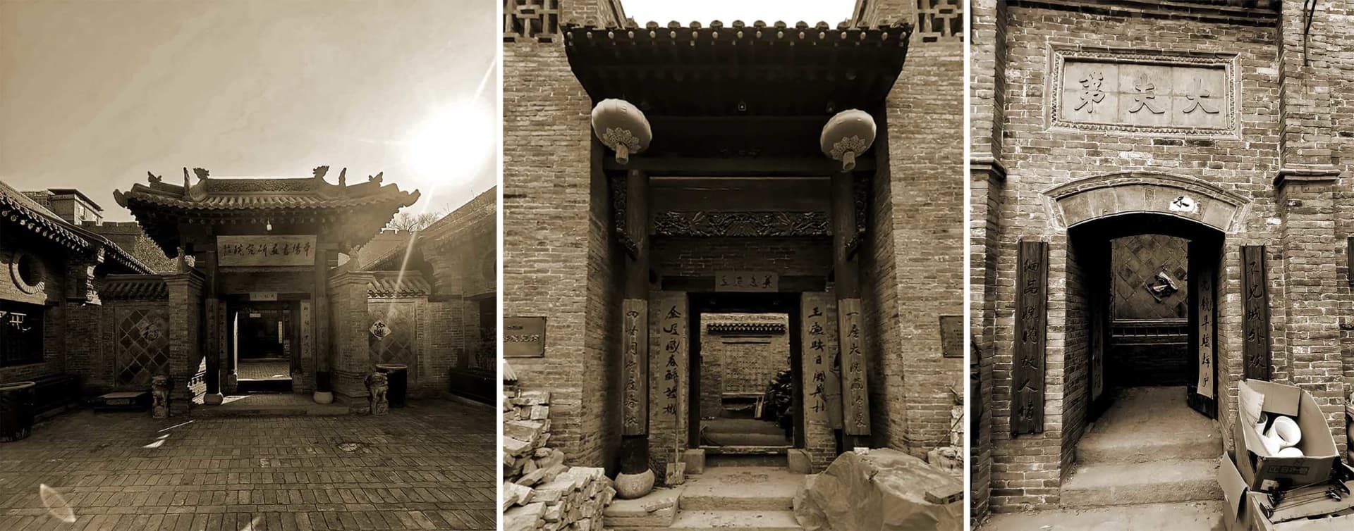 Black and white photograph of an Asian-style building with a brick exterior, stone roof, and arched entrance, set in a courtyard with a potted plant