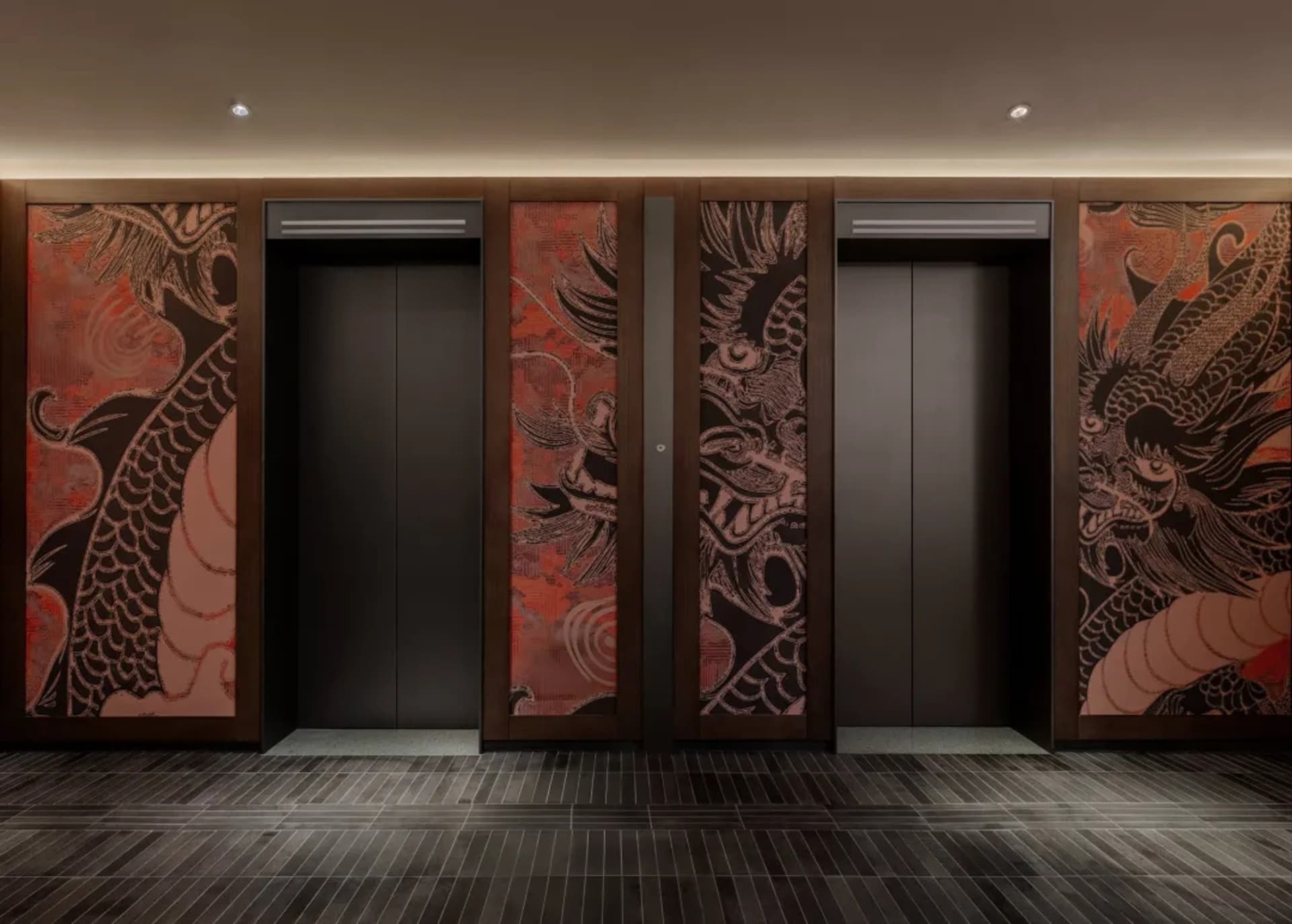 A dimly lit hallway with two unique doors featuring Asian-inspired artwork, set against a warm wooden backdrop