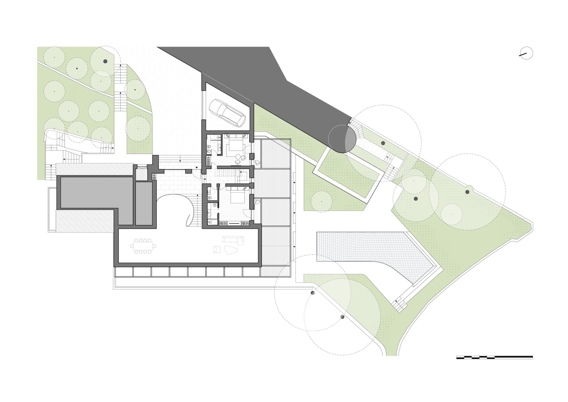Black and white floor plan of a modern house with open and closed areas, featuring natural lighting and classic design