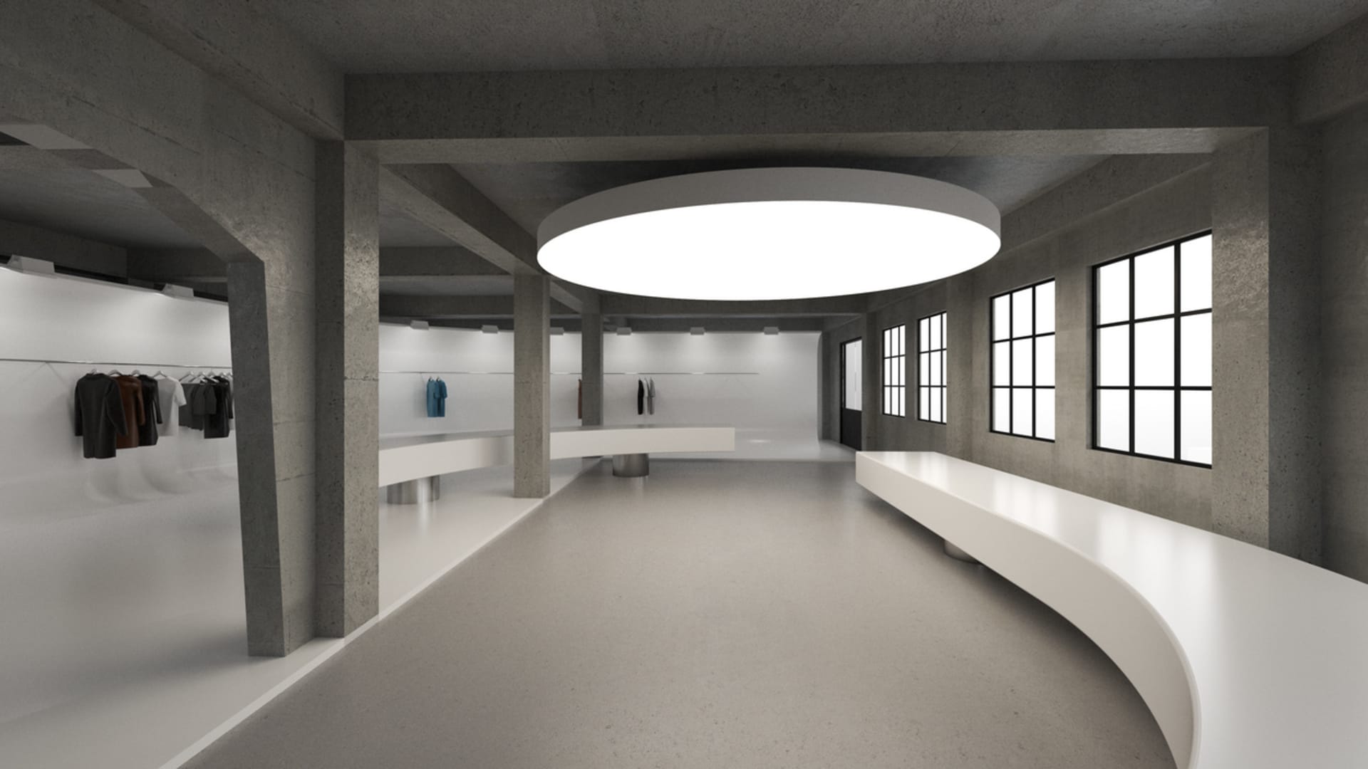 A large, empty lobby with a concrete floor, dimly lit, creating a moody atmosphere