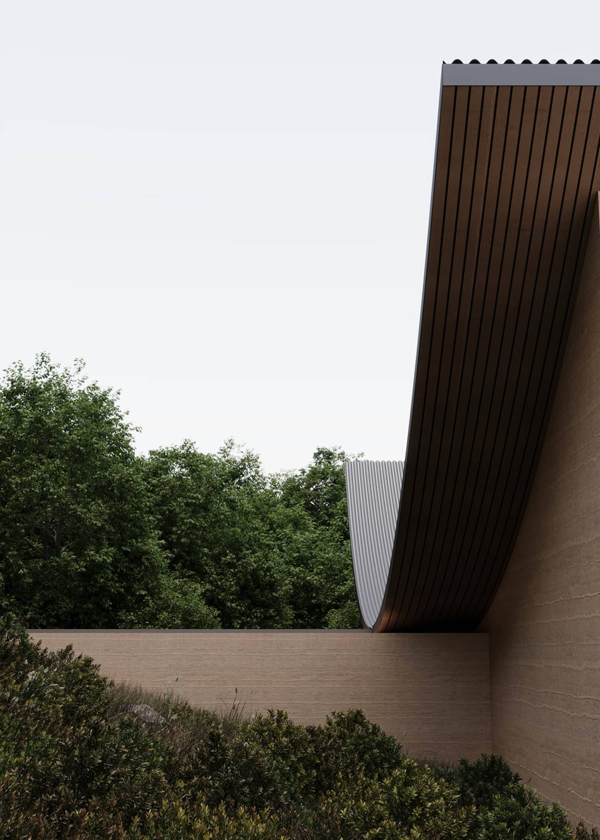 Photograph of a modern building with a curved roof, concrete exterior, and natural light from above