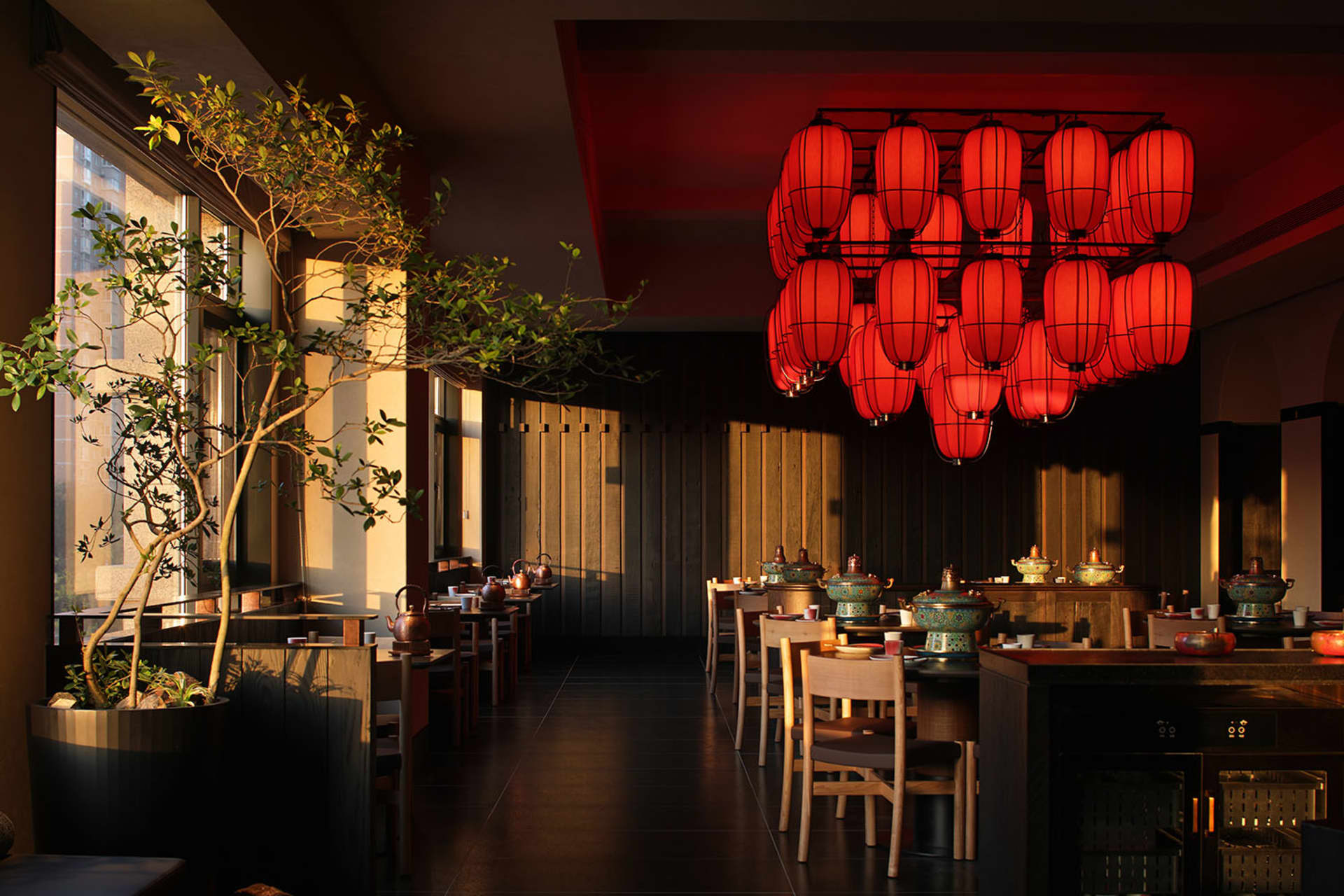 Cozy restaurant with modern design, red accents, dim lighting, and dining items