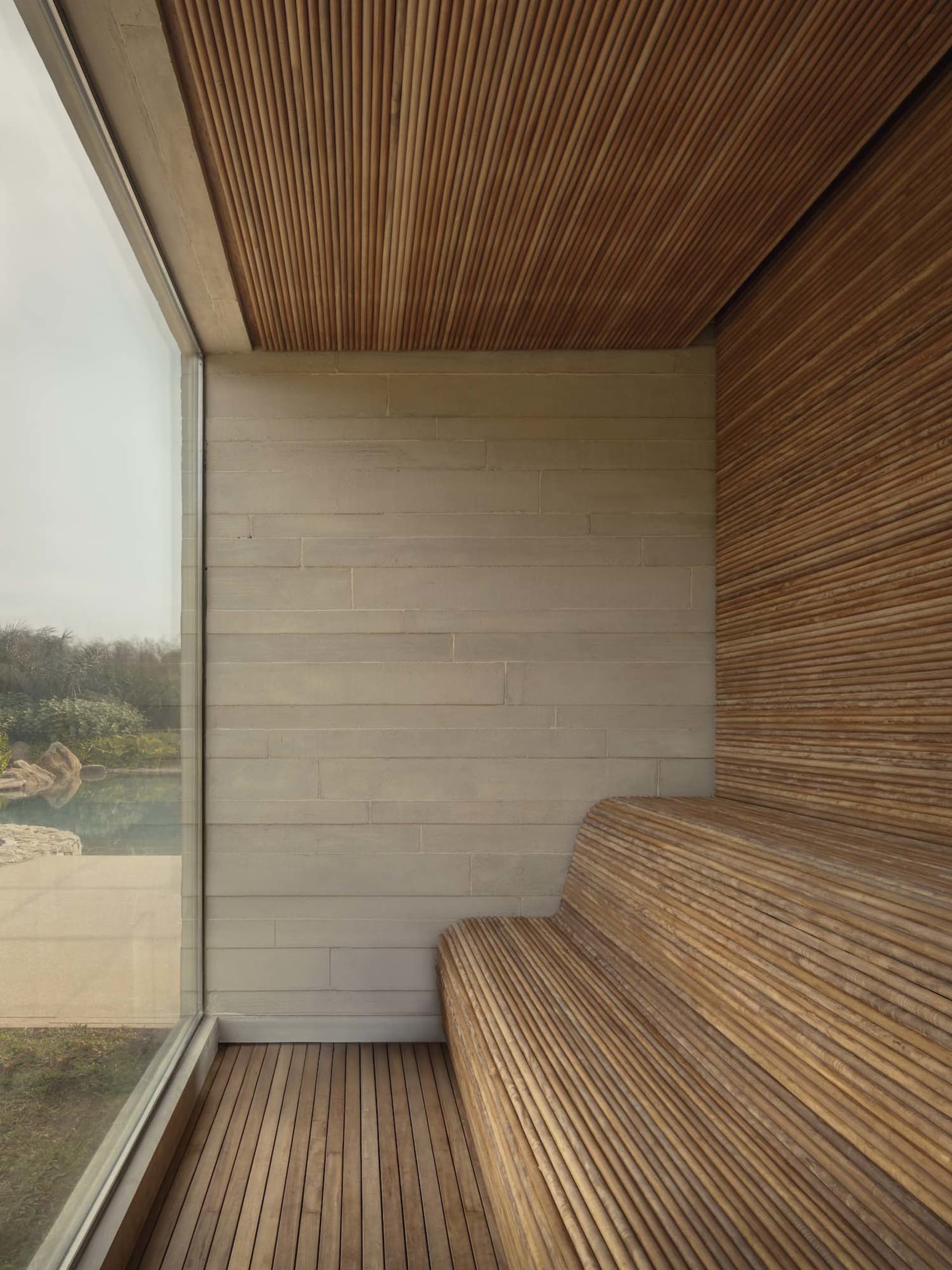 Cozy room with a wooden bench and wooden wall, soft and diffused lighting, and a warm atmosphere