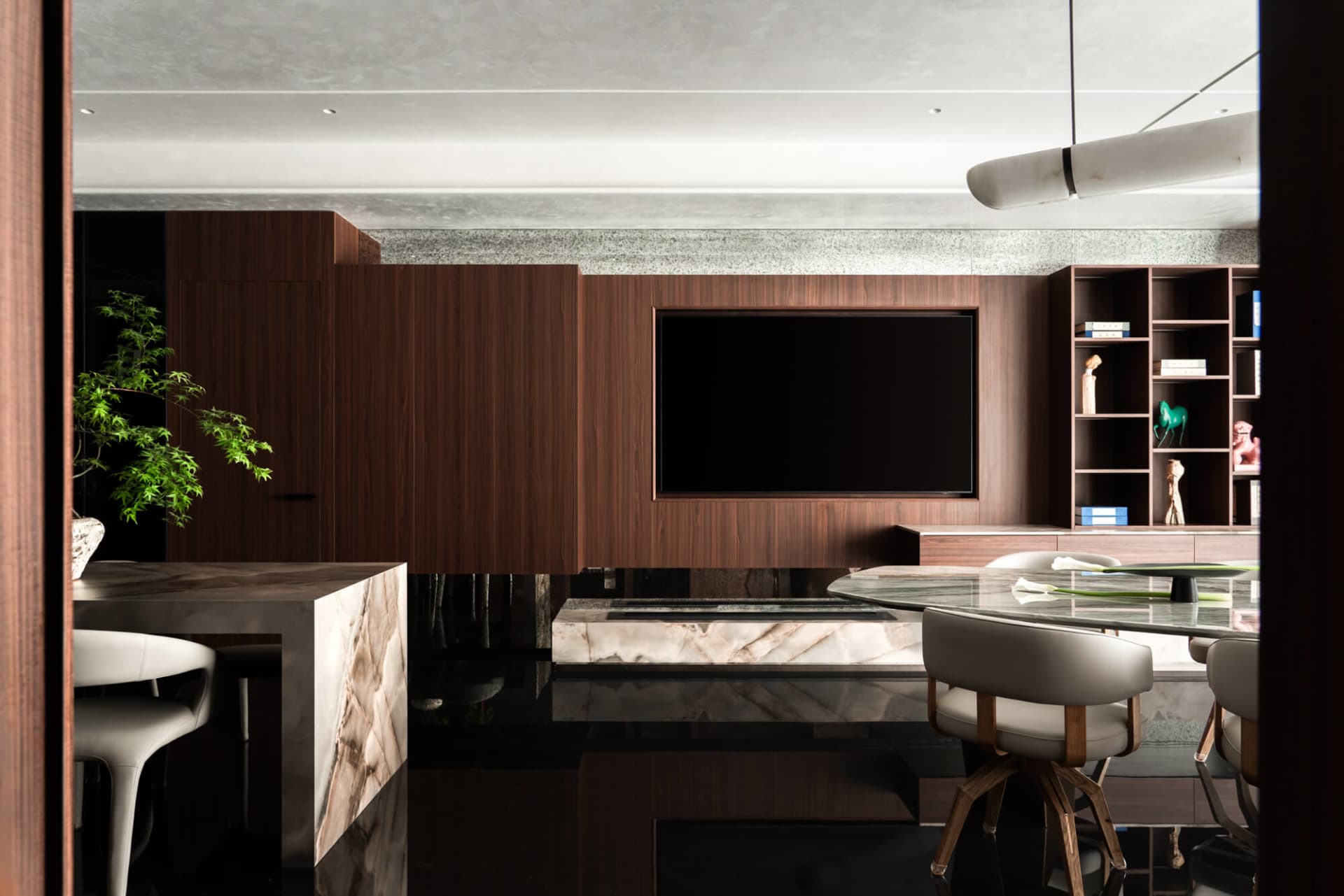 Modern luxury dining room with dark walnut built-in entertainment wall, large wall-mounted TV, marble dining table and light grey upholstered chairs.