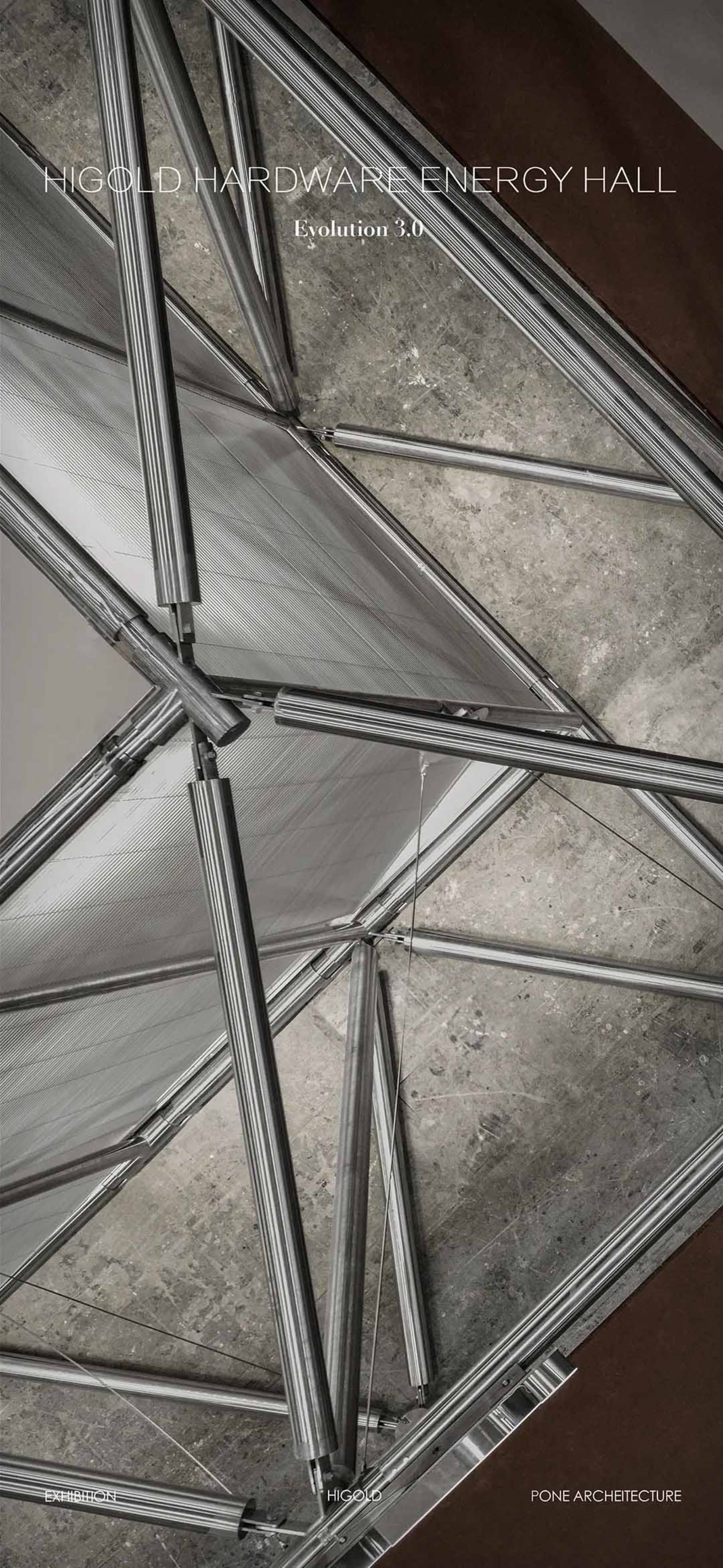 Low-angle architectural photograph looking up at a complex stainless steel space frame structure with concrete ceiling and translucent panels.