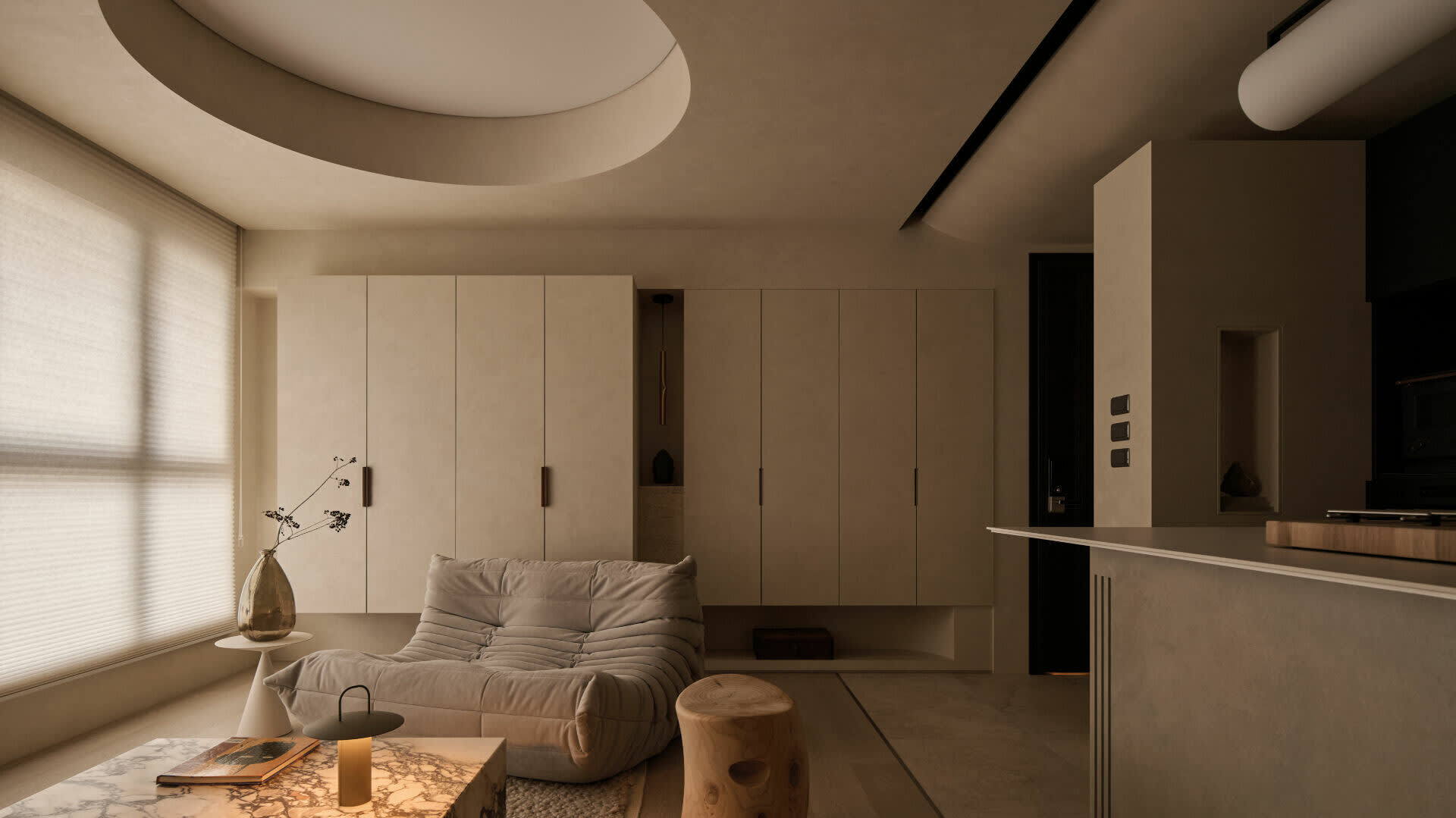 Modern minimalist living room featuring a Togo-style modular sofa, micro-cement walls and ceiling with a large circular recessed light, marble coffee table, and natural wood elements.