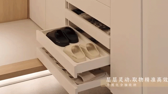Japandi storage wall with warm wood sliders and minimalist entryway organization.