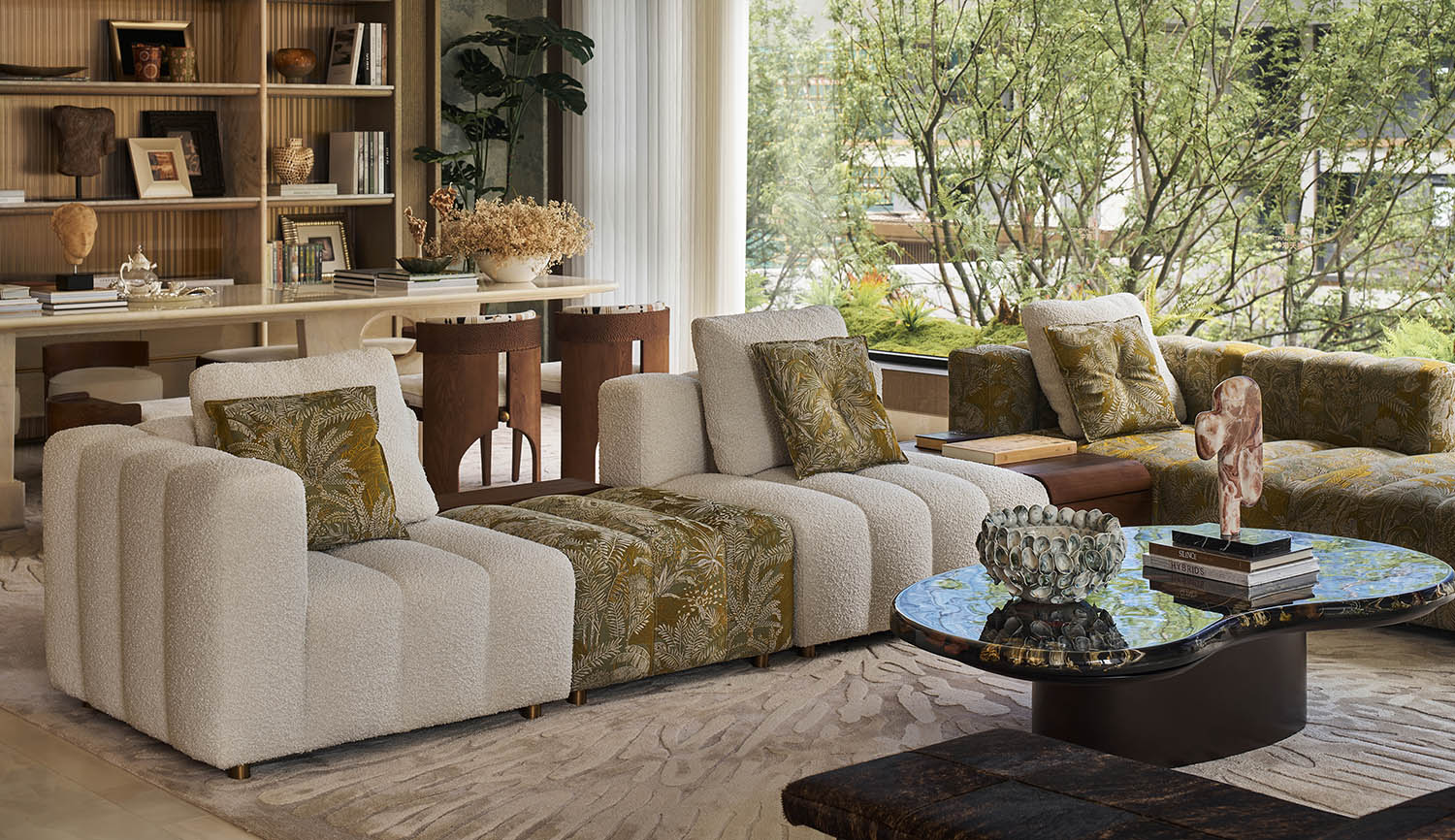 Minimalist living room with fabric sofa, warm wood accents, and soft neutral earthy tones.