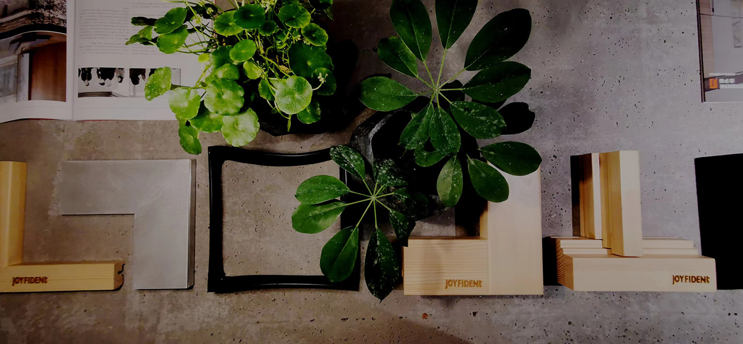 Wabi-sabi neutral interior with concrete millwork and restrained decorative objects.