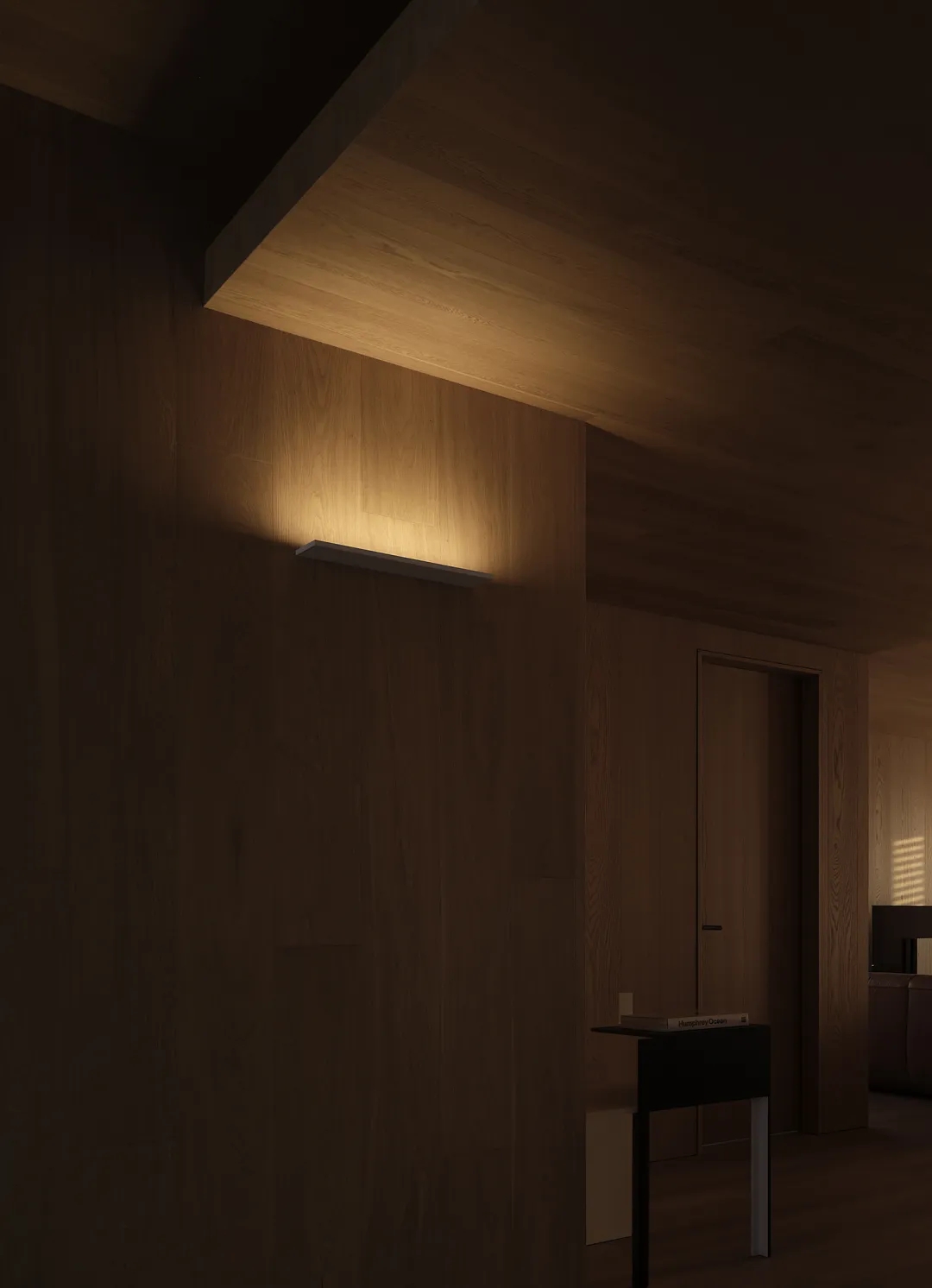 Japandi bedroom with warm indirect lighting, natural wood wall panels, and a calm neutral color palette.