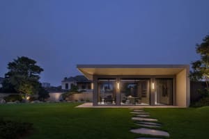 A modern residential exterior designed with concrete.