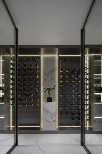 Modern wine cellar with marble and metal details