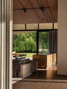 A modern living room featuring wood elements.