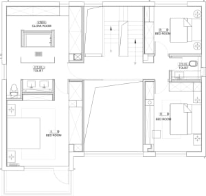 Floor plan of a modern residential living space with bedrooms, bathrooms, and a staircase.