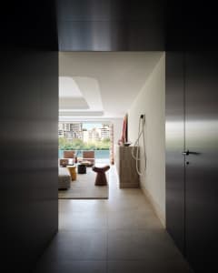 Modern living room with concrete and brick materials