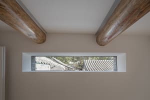 A modern interior featuring wooden beams