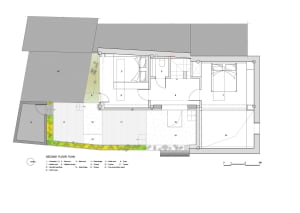 Modern architectural floor plan with concrete materials in a residential setting.