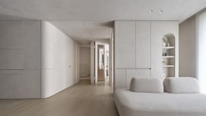 Contemporary living room designed with neutral tones and minimalist aesthetics.