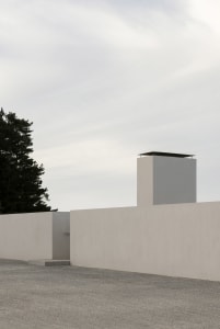 A minimalist concrete exterior featuring a simple, clean design.