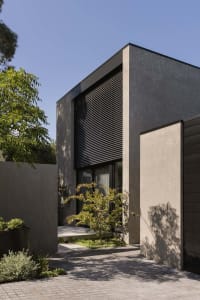 Concrete exterior walls of a modern residential home with a minimalist aesthetic.
