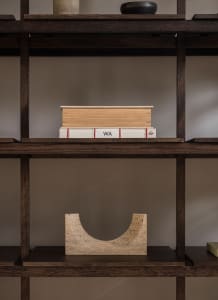 A modern wooden bookshelf with minimalist design