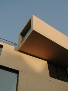 A modern building made of concrete with clean lines and minimalist design.
