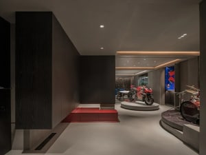 Indoor living area featuring modern industrial design with concrete and wood accents