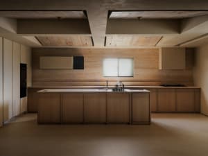 Industrial kitchen with wooden cabinets and countertops.