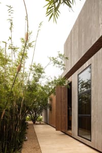 A modern building with concrete exterior features minimalistic design elements.