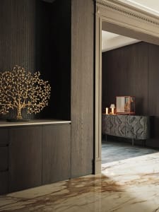 A modern hotel corridor featuring marble flooring and wooden cabinets with geometric designs.