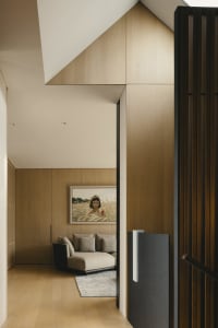 Modern minimalist residential space featuring wooden interior design