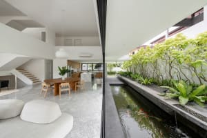 Modern residential lounge featuring concrete flooring and minimalist design