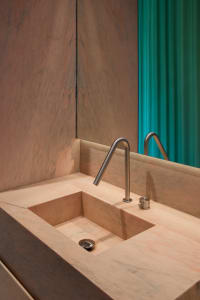 Modern marble bathroom with a sleek, contemporary design.