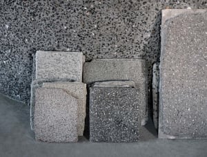 Concrete material samples with industrial texture and finish.