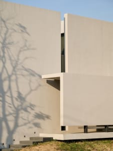 Modern building exterior made of concrete with a minimalist design.