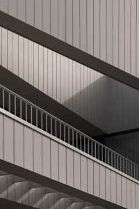 Modern metallic staircase interior design showcasing sleek, minimalist lines.