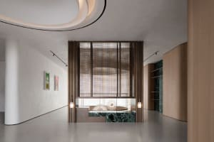 Modern, sleek lobby featuring a marble floor and wooden accents.