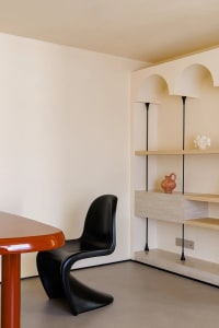 Minimalist music room with drywall panels and acoustic treatment for soundproofing.